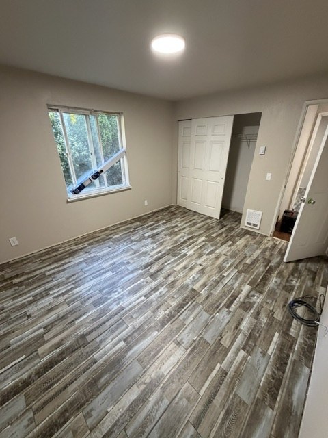 Finished wood-look flooring in a bedroom